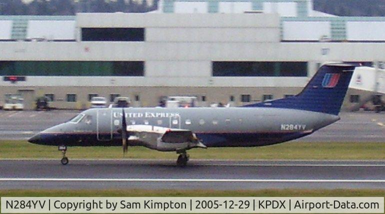 N284YV, 1994 Embraer EMB-120ER Brasilia C/N 120.284, United Airlines EMB-284 N284YV On Runway 10L KPDX