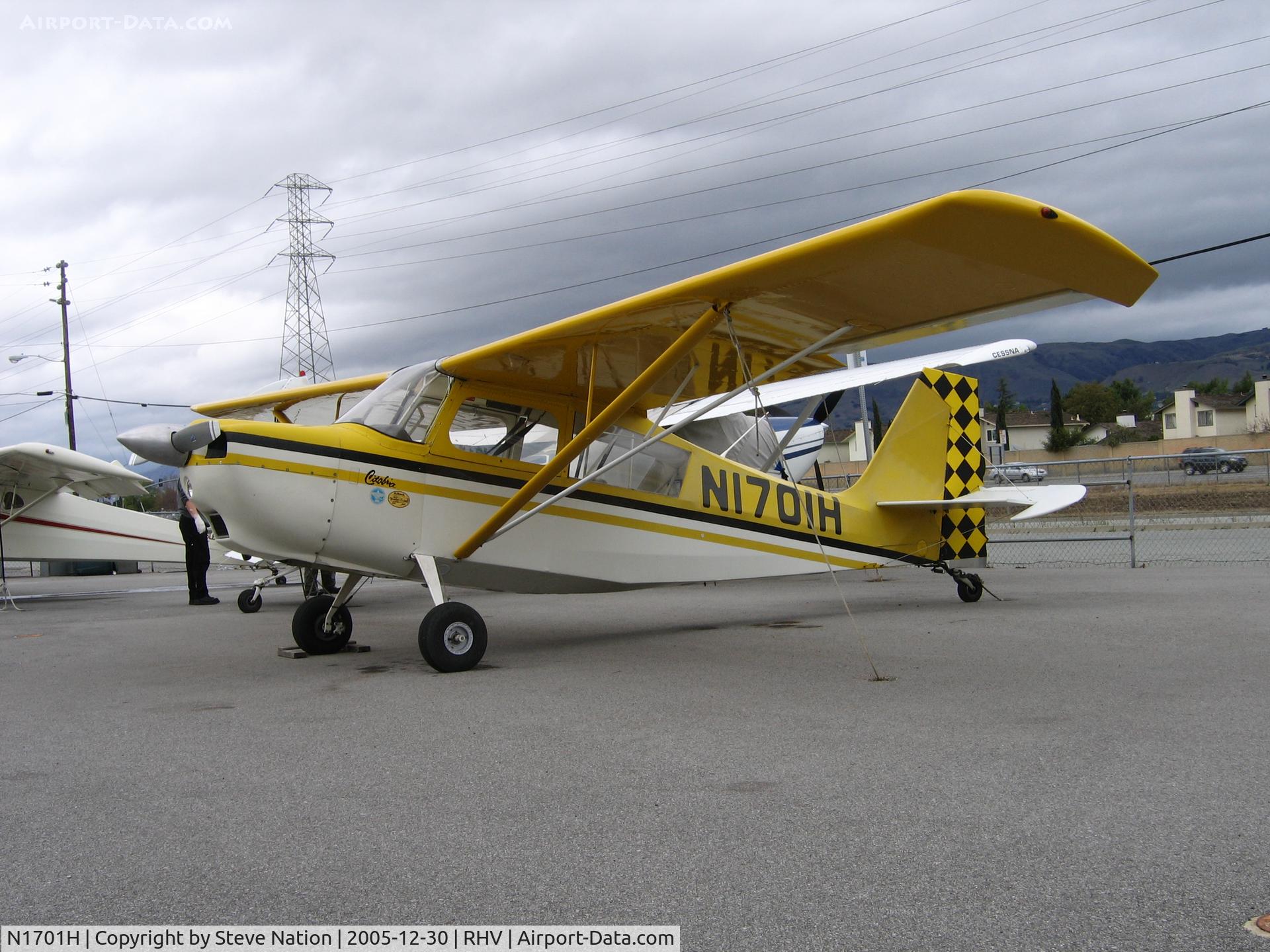 N1701H, 1974 Bellanca 7KCAB Citabria C/N 454-74, California In Nice Inc. 1974 Bellanca 7KCAB between rainstorms at Reid-Hillview Airport, San Jose, CA