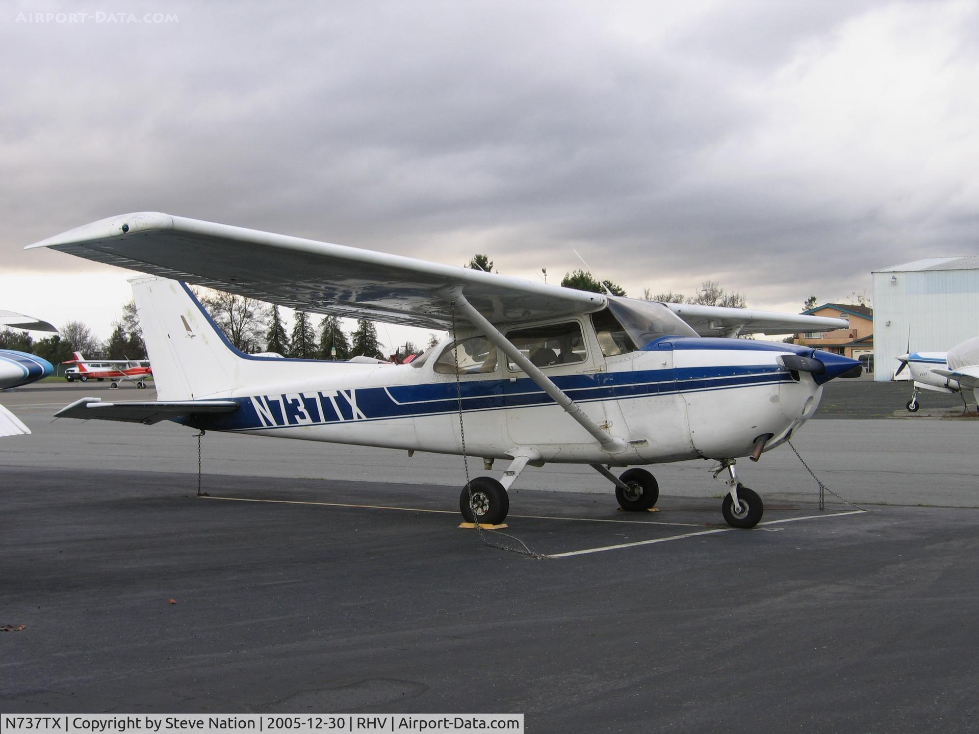 N737TX, 1977 Cessna 172N C/N 17269672, Air Nice 1977 Cessna 172N between rainstorms at Reid-Hillview, San Jose, CA
