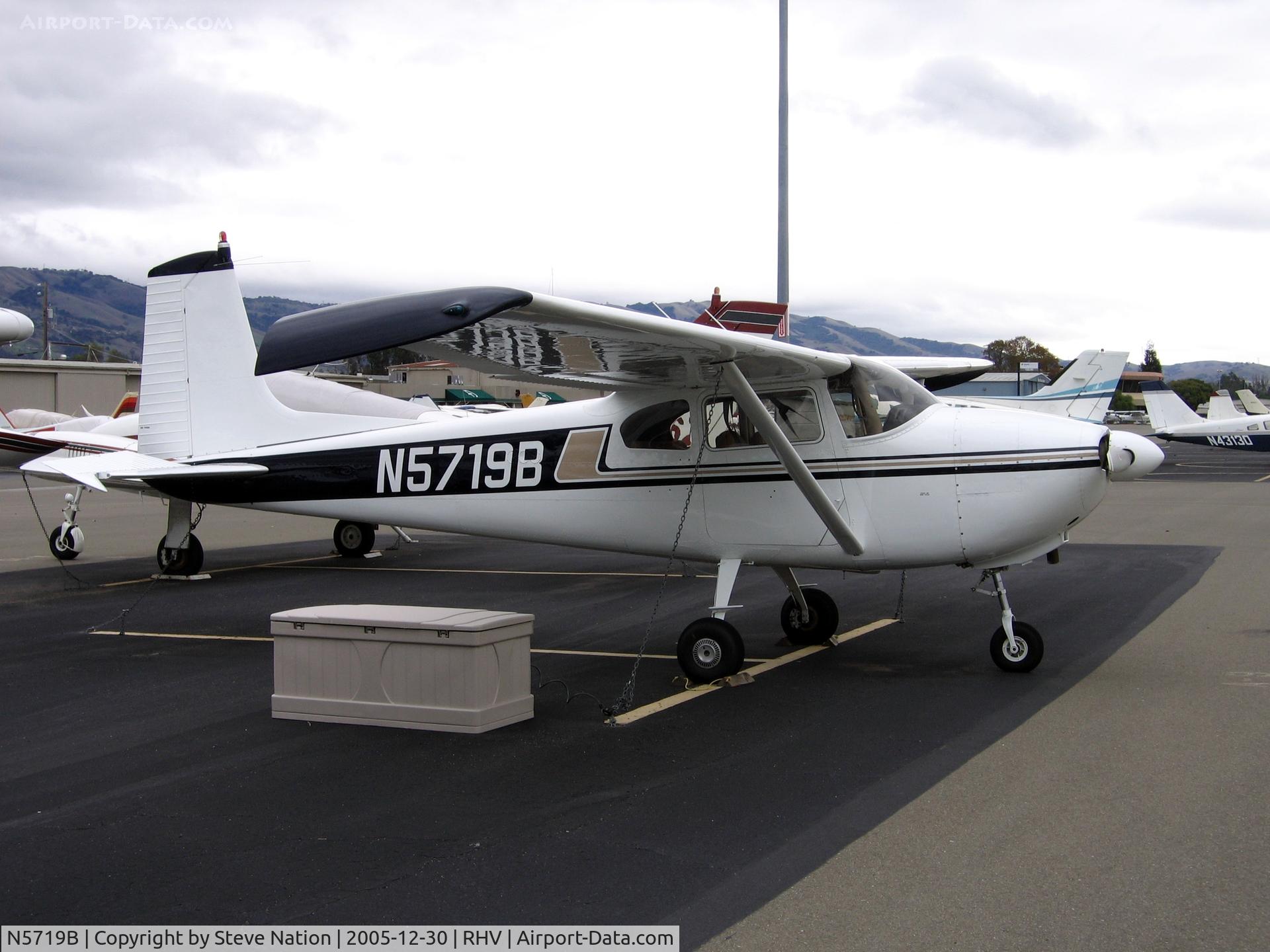 N5719B, 1956 Cessna 182 Skylane C/N 33719, 1956 Cessna 182 (straight tail) between rainstorms at Reid-Hillview Airport, San Jose, CA