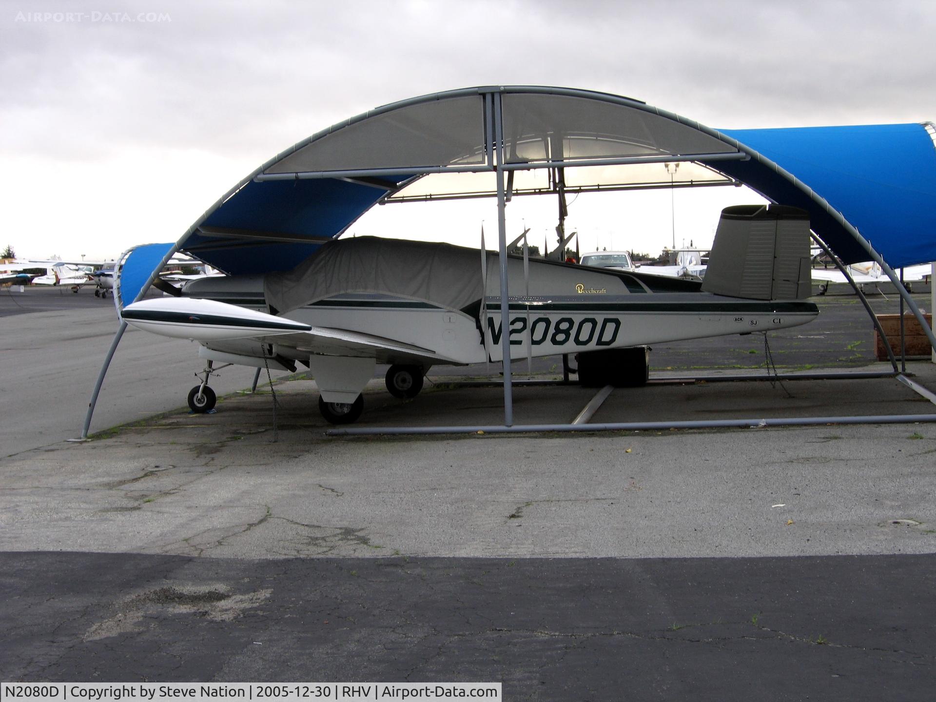 N2080D, 1953 Beech D35 C/N D-3431, 1953 Beech D35 Bonanza under shelter &  between rainstorms at Reid-Hillview Airport, San Jose, CA