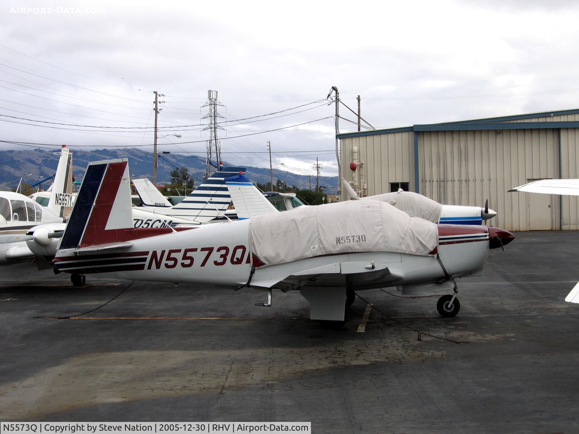 N5573Q, 1965 Mooney M20C Ranger C/N 2975, 1965 Mooney M20C between rainstorms at Reid-Hillview Airport, San Jose, CA