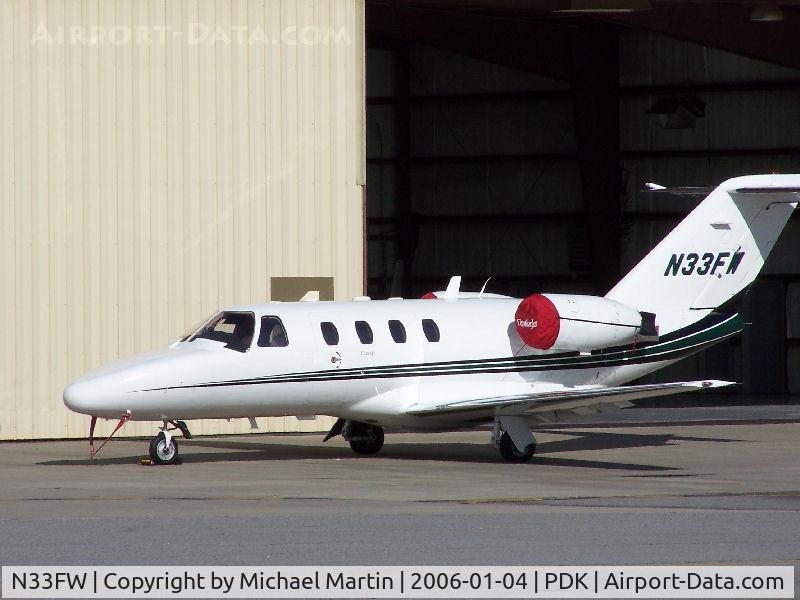 N33FW, 1997 Cessna 525 CitationJet CJ1 C/N 525-0203, Tied down @ PDK