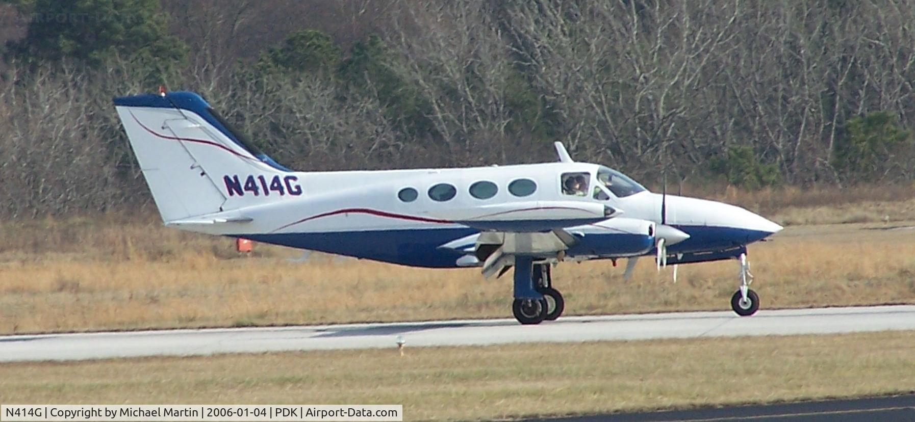 N414G, 1969 Cessna 414 Chancellor C/N 414-0024, Landing PDK on 20L