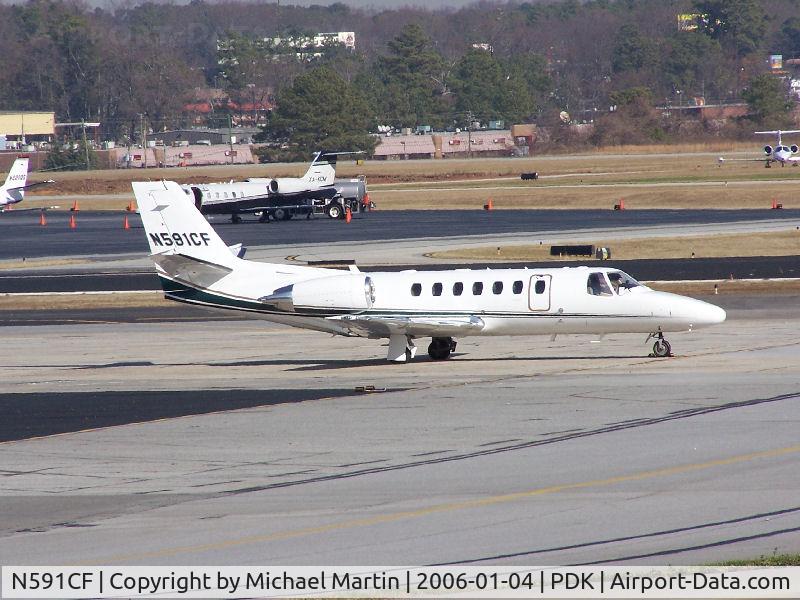 N591CF, 2004 Cessna 560 Citation Encore C/N 560-0661, Tied down @ Signature Flight Services