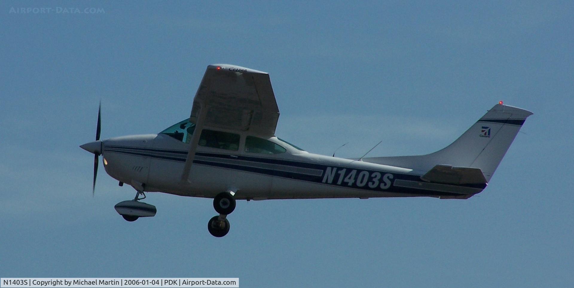 N1403S, 1976 Cessna 182P Skylane C/N 18264963, Departing PDK