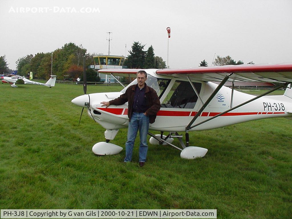 PH-3J8, 2000 Comco Ikarus C42 C/N 0003-6244, The PH-3J8 in front of the Klausheide (EDWN) tower.