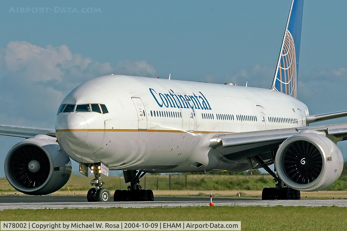 N78002, 1998 Boeing 777-224 C/N 27578, Rotating onto runway 36L.