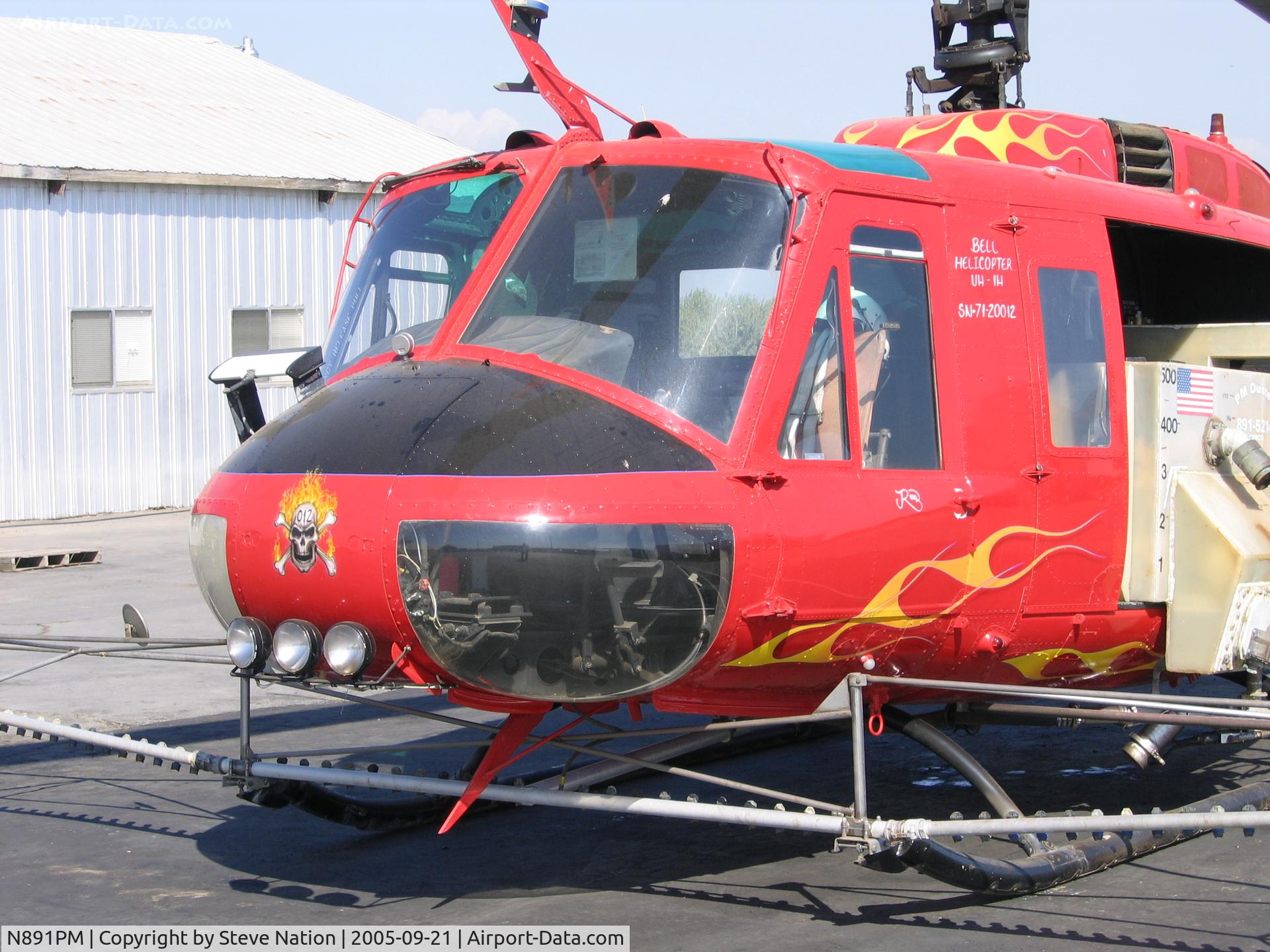 N891PM, 1971 Bell UH-1H C/N 7120012, Nose art on Porter FS 1971 Bell UH-1H sprayer (71-20012) near Durham, CA