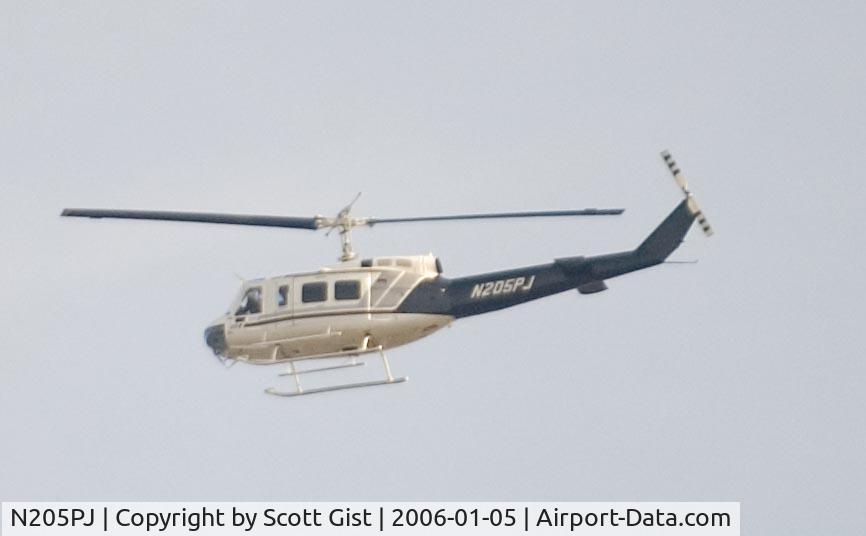 N205PJ, 1964 Bell UH-1H Iroquois C/N 4324, Quick fly-by, sorry for the poor quality