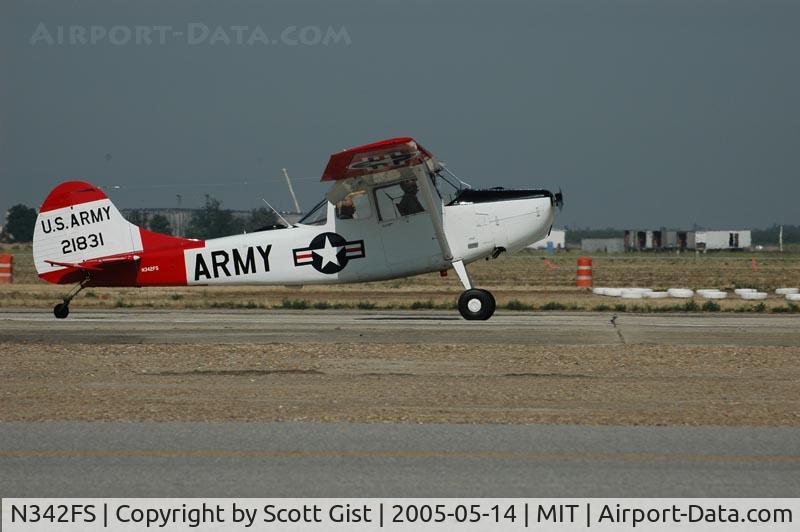 N342FS, Cessna 305A C/N 21831, Touching down in Shafter Ca.