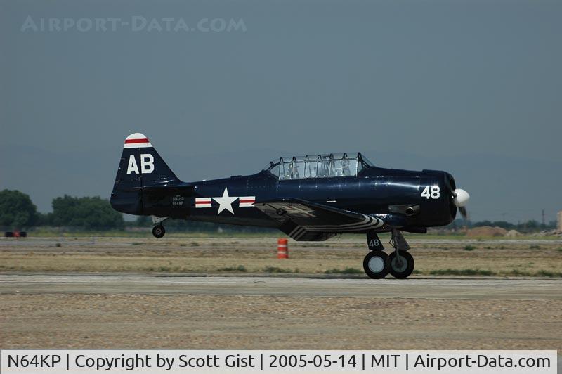 N64KP, 1943 North American AT-6D C/N 84936, Touching down in Shafter Ca.