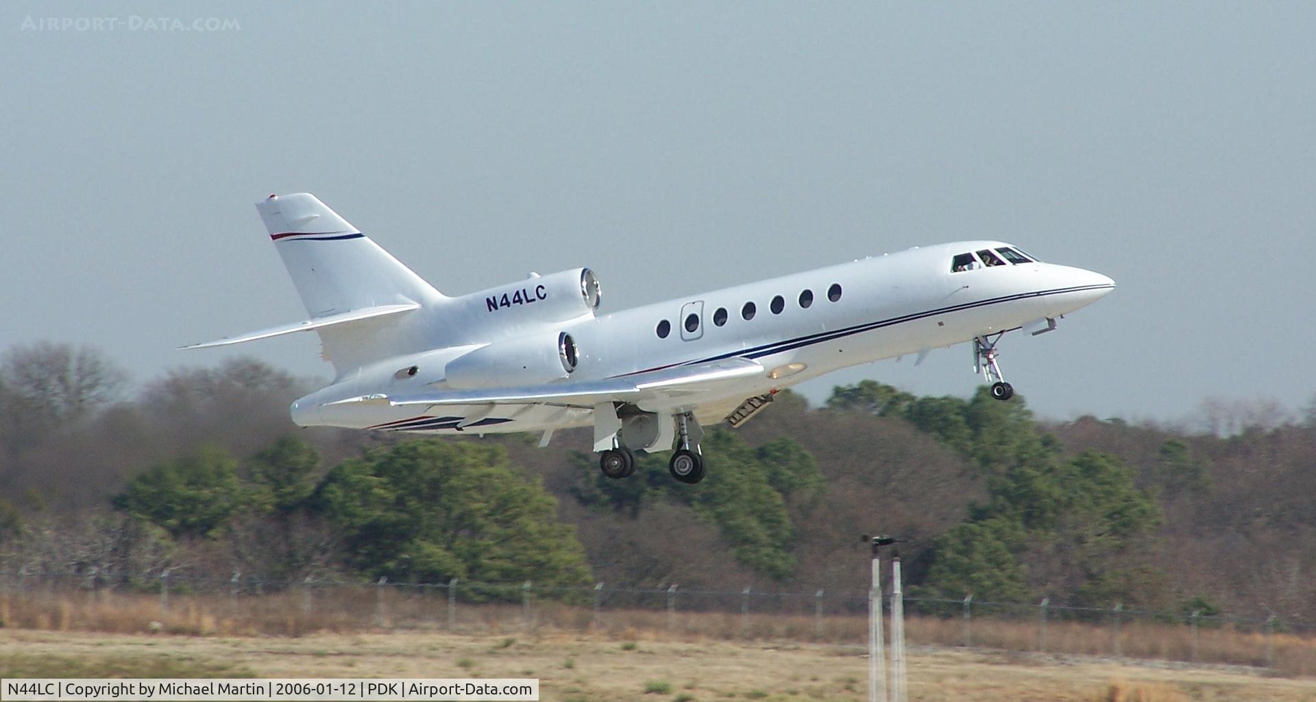 N44LC, 2008 Dassault Falcon 900EX C/N 216, Departing PDK on 20L