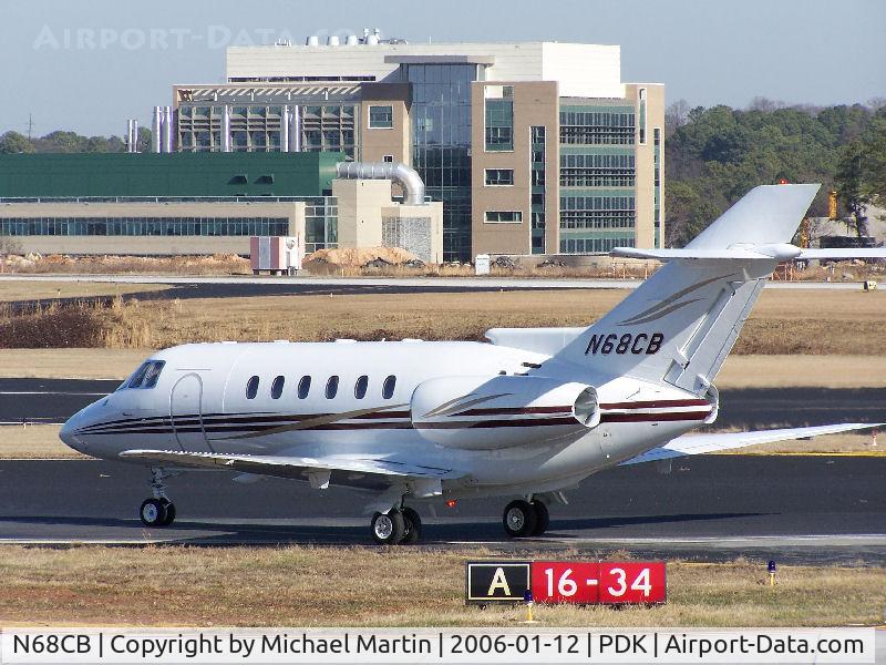 N68CB, 1999 Raytheon Hawker 800XP C/N 258453, Cracker Barrel arrives @ PDK