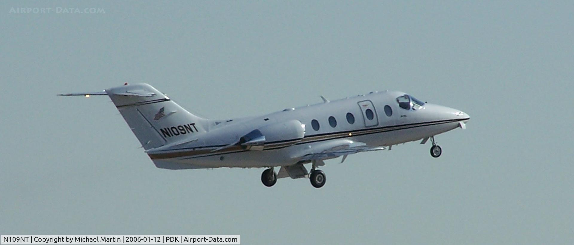 N109NT, Raytheon Aircraft Company 400A C/N RK-374, Departing PDK - Starting to rotate gear.