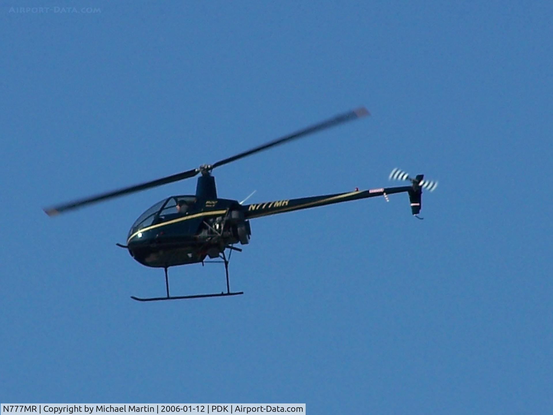 N777MR, 2001 Robinson R22 Beta C/N 3201, Over flying PDK