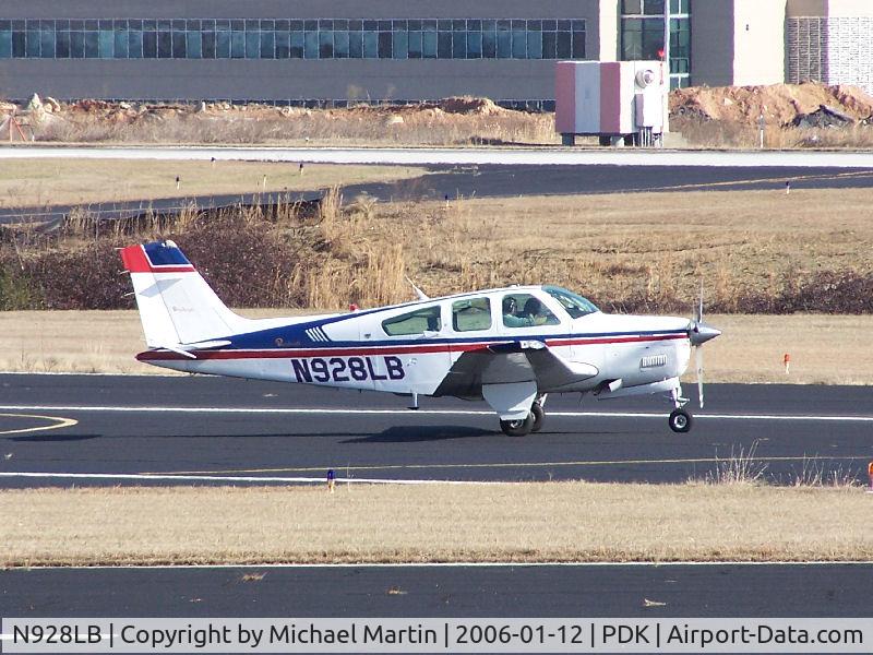 N928LB, 1987 Beech F33A Bonanza C/N CE-1174, Departing PDK on 20R