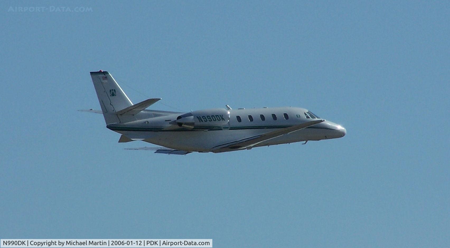 N990DK, 1999 Cessna 560XL Citation Excel C/N 560-5019, Departing PDK on 20L