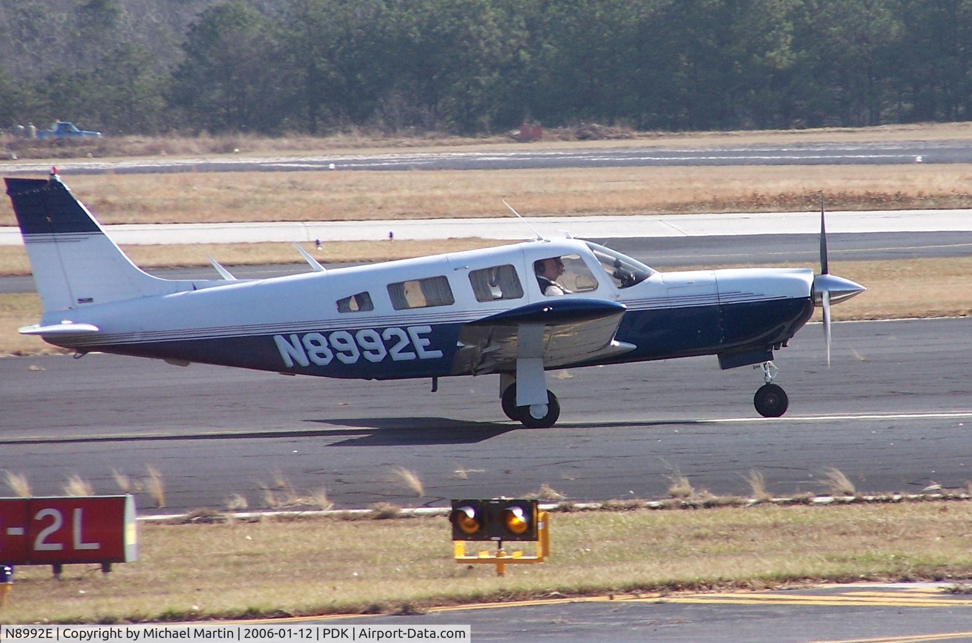 N8992E, 1976 Piper PA-32R-300 Cherokee Lance C/N 32R-7680187, Taxing to Mercury Air Center
