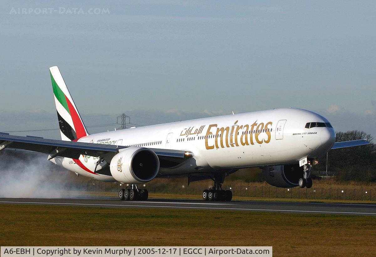 A6-EBH, 2005 Boeing 777-31H/ER C/N 32707, Smokey arrival on 06R.