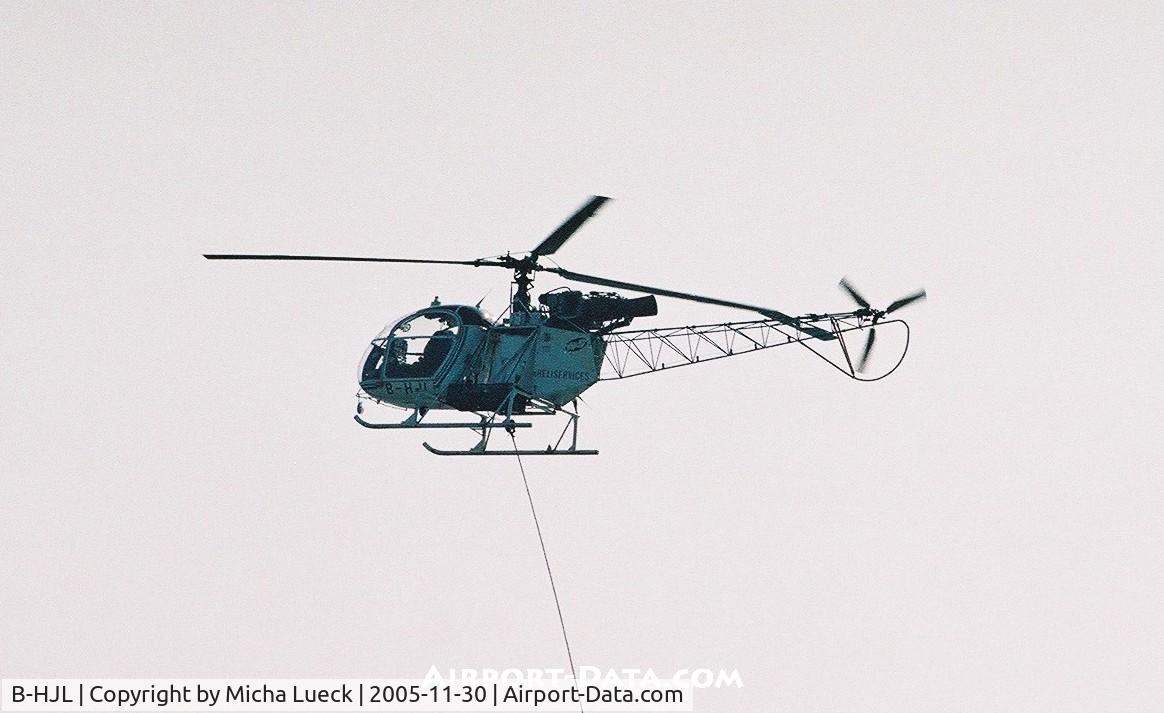 B-HJL, Aérospatiale SA-315B Lama C/N 2618, Eurocopter 315B Lama of Heliservices Hong Kong working on powerlines on Lantau island, close to Hong Kong airport