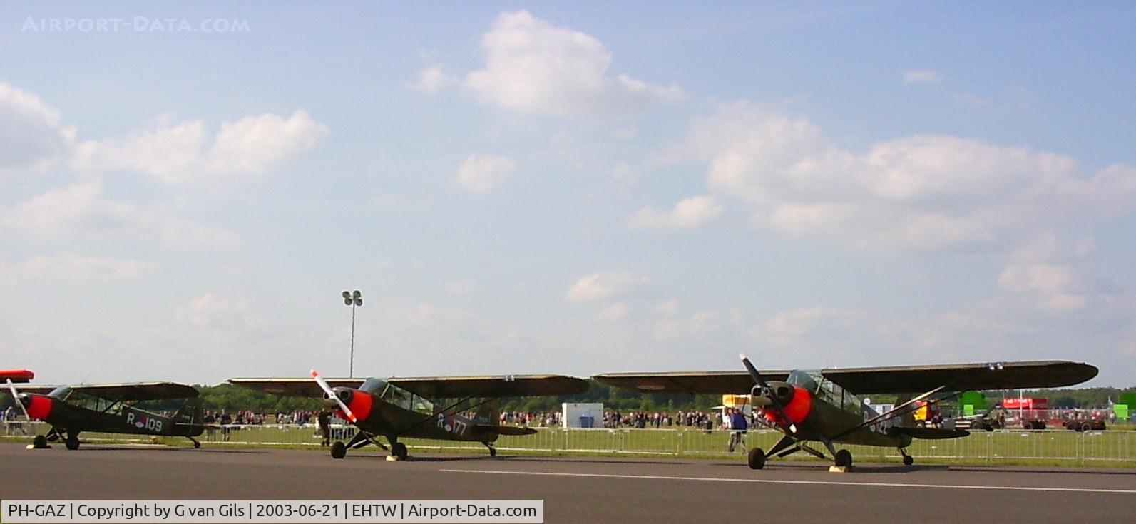 PH-GAZ, Piper L-21B Super Cub C/N 18-3537, A nice photo off three Piper L-21 A/U-7B Cub's at the Twenthe airshow 2003. The PH-GAZ = R-109, The PH-PPW = R-122 and the PH-KNR = R-177.