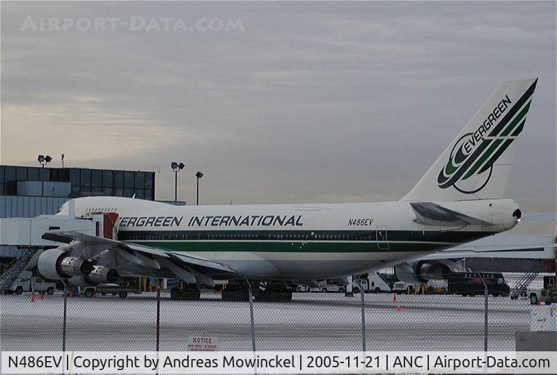 N486EV, 1974 Boeing 747-212B C/N 20888, Originally delivered to Singapore Airlines in 1974, this 747-212B has served with, among others, Pan Am, Tower Air, Flying Tigers and Nigeria Airways.  Now serving Evergreen.  Unusual to see a freighter at a passenger gate, though.