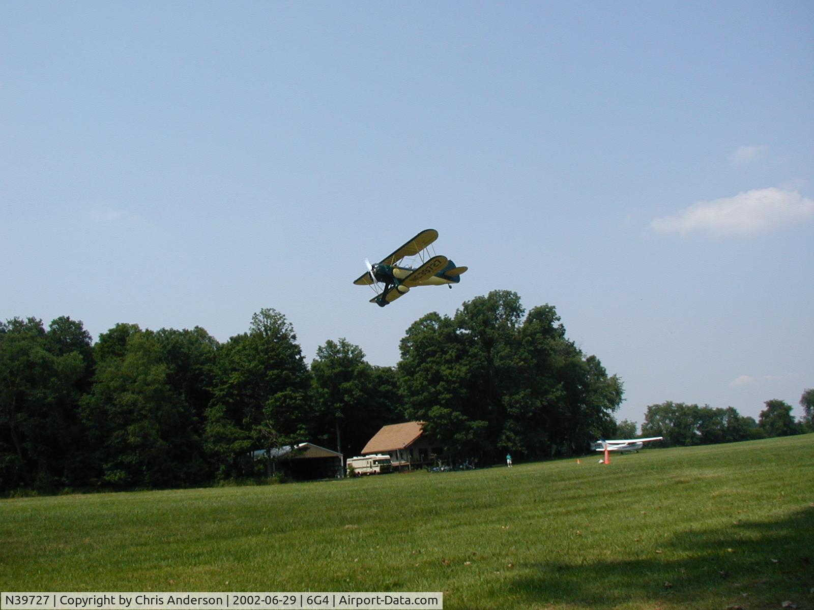 N39727, 1942 Waco UPF-7 C/N 5860, Low pass on Wynkoop Airport
