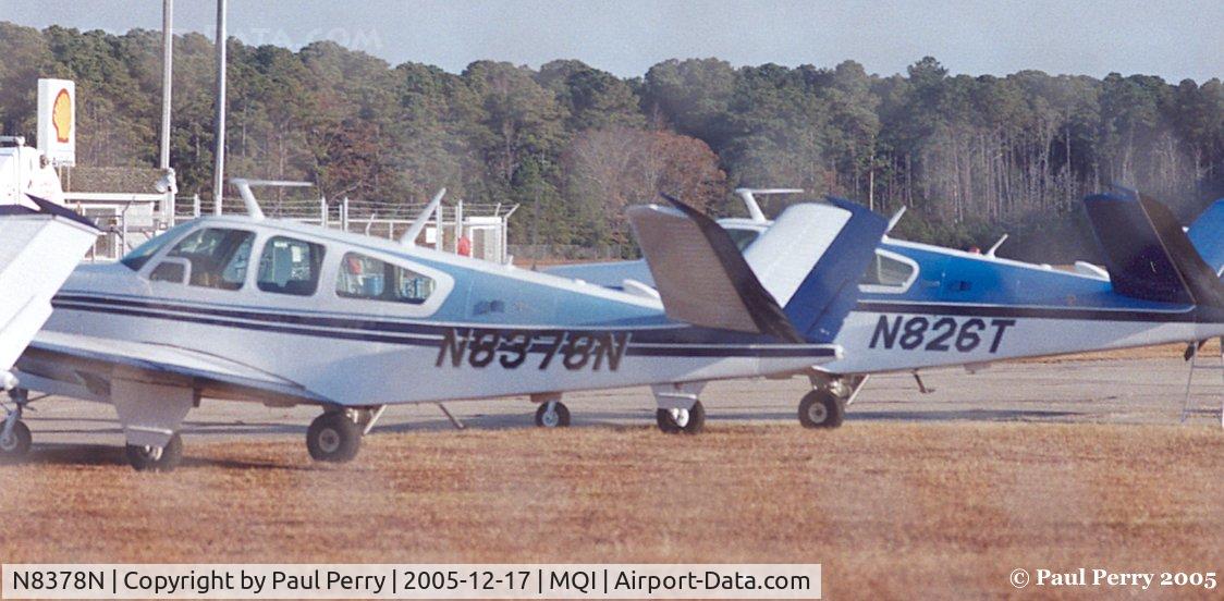 N8378N, 1968 Beech V35A Bonanza C/N D-8760, Looking through the fence, there sat three V-tails, all in a row.