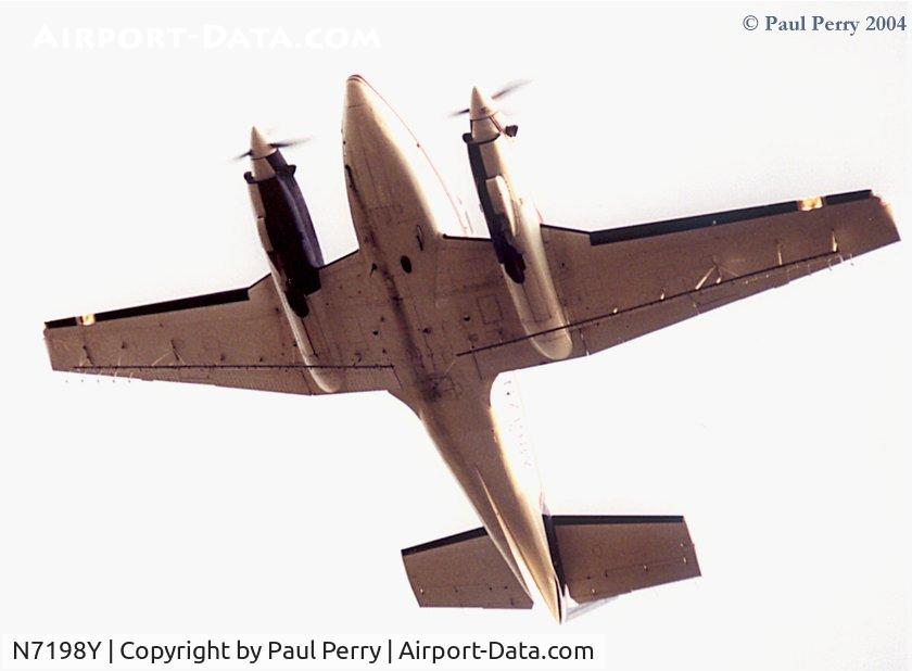 N7198Y, 1972 Beech 65-A90-4 C/N LU-02, Conducting spray operations over Ahoskie