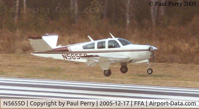 N5655D, 1967 Beech V35 Bonanza C/N D-8406, Touching down near the Wright Brothers' Memorial after his flyby