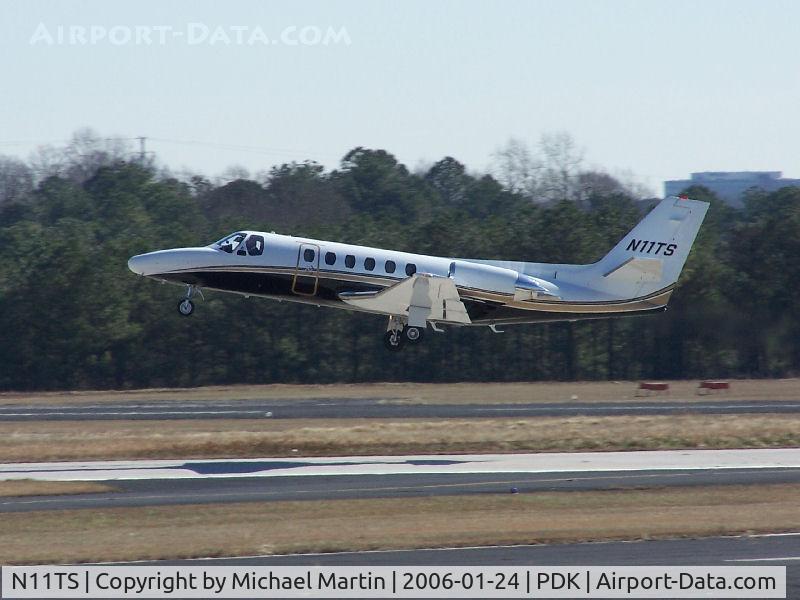 N11TS, 1999 Learjet 60 C/N 60-151, Departing PDK - Starting to rotate gear.
