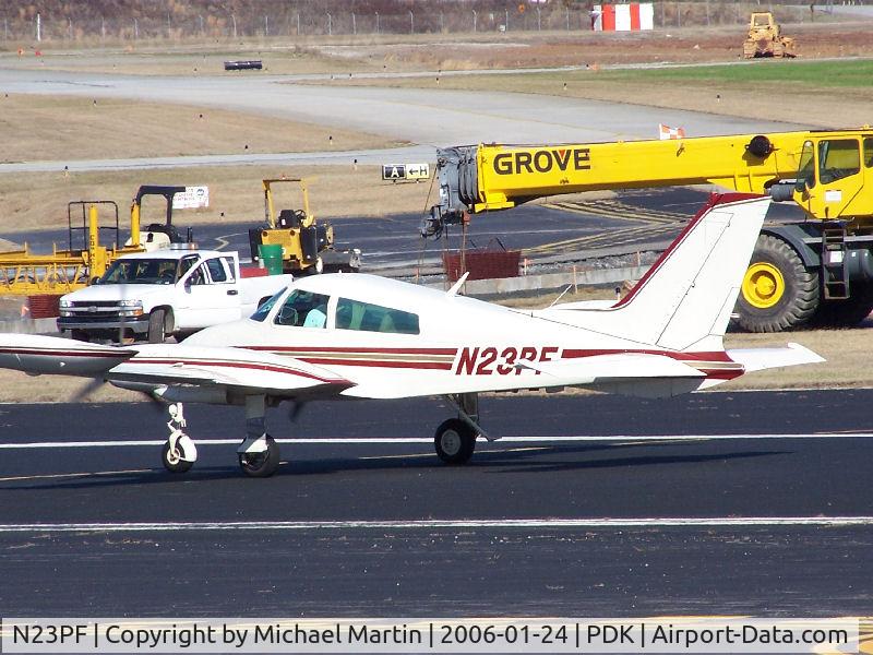 N23PF, 1968 Cessna 310P C/N 310P0044, Taxing past on going construction