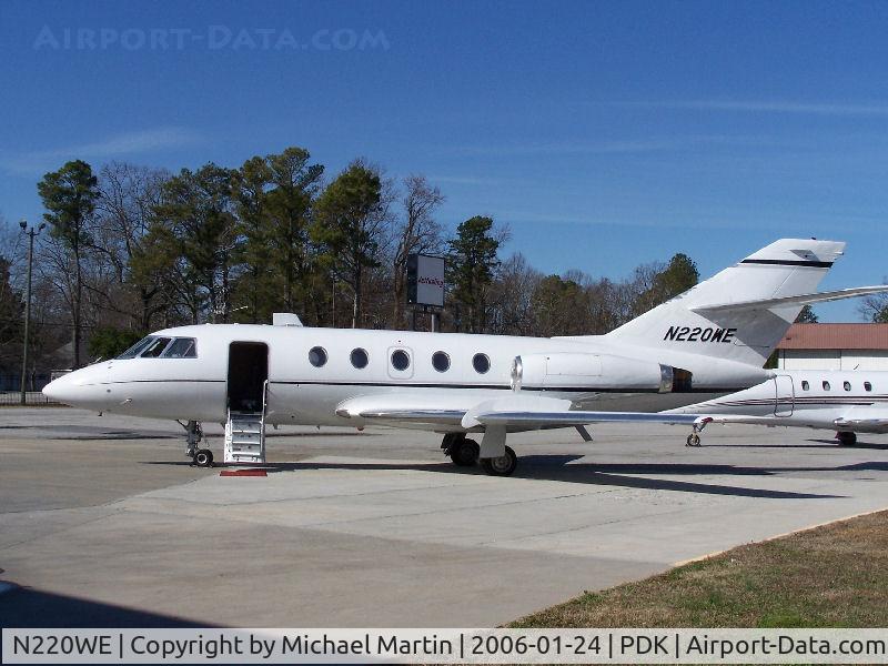 N220WE, 1976 Dassault Falcon 20F C/N 349, Parked at Jet Fueling @ PDK