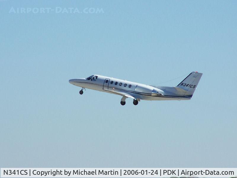 N341CS, 2005 Cessna 550 C/N 550-1106, Departing PDK - Starting to rotate gear.