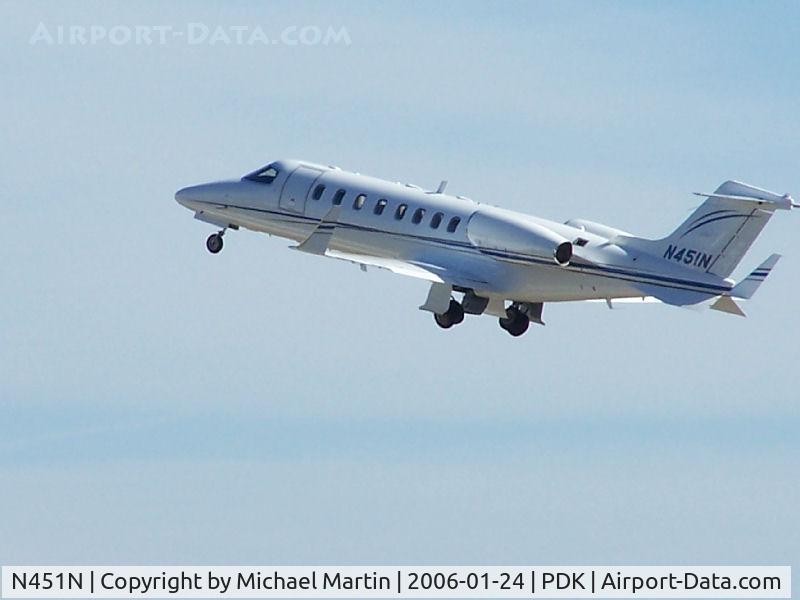 N451N, Learjet Inc 45 C/N 230, Departing PDK - Starting to rotate gear.