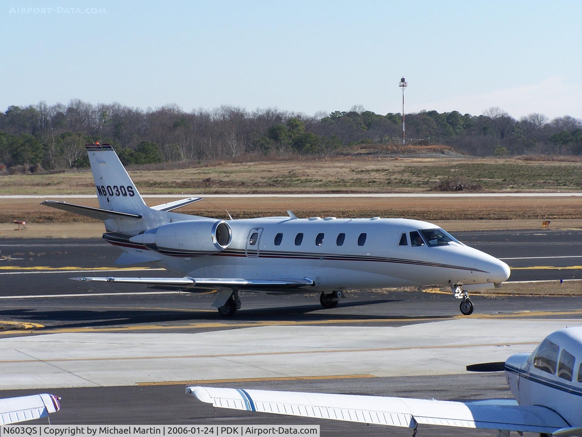 N603QS, 2001 Cessna 560XL Citation Excel C/N 560-5203, Taxing past on going construction