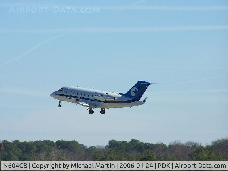 N604CB, 2000 Bombardier Challenger 604 (CL-600-2B16) C/N 5448, Departing PDK - Starting to rotate gear.