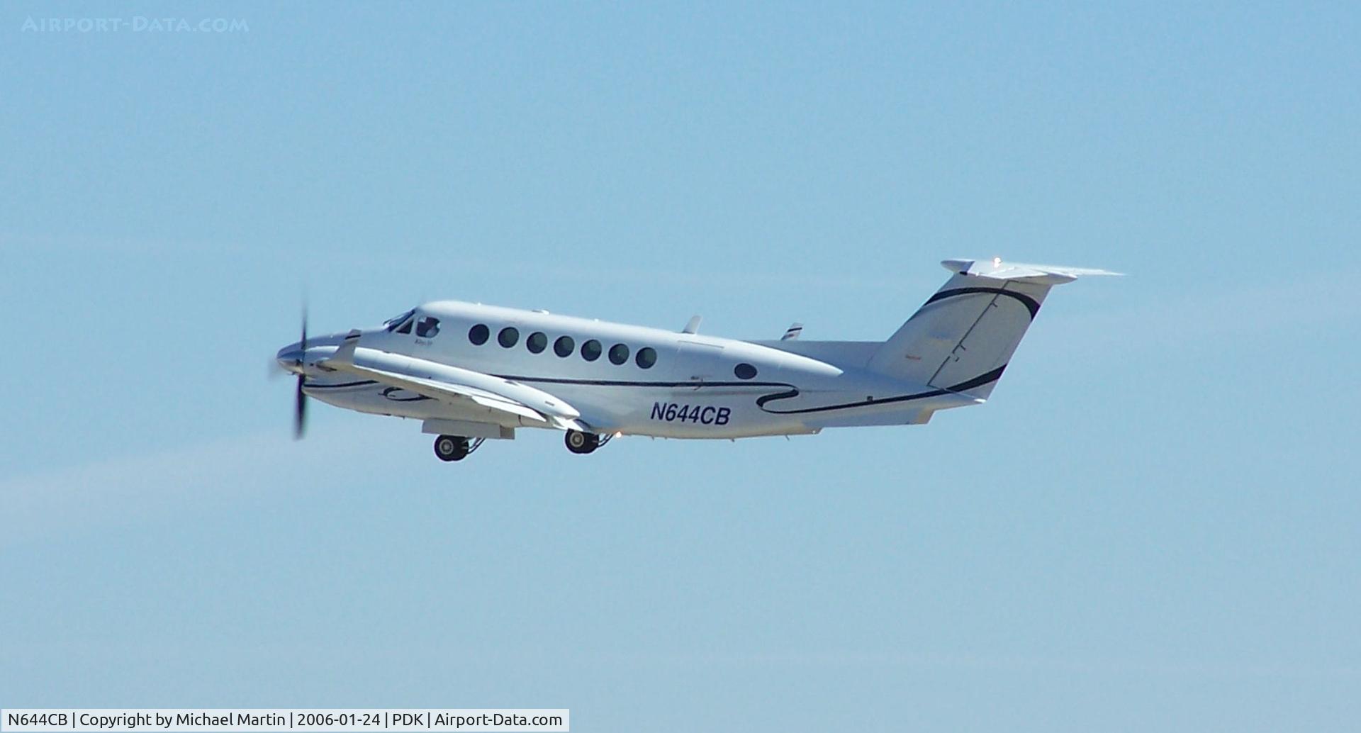 N644CB, Raytheon Aircraft Company B300 C/N FL-394, Departing PDK - Starting to rotate gear.