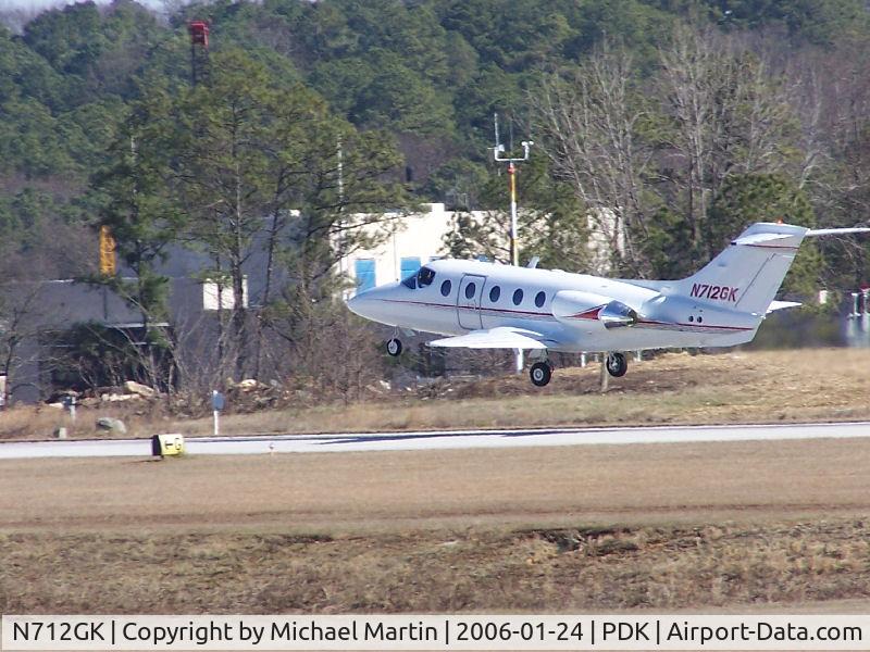 N712GK, 1992 Beech 400A Beechjet C/N RK-44, Departing PDK - Starting to rotate gear.