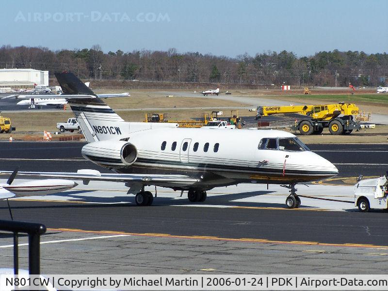 N801CW, 1984 British Aerospace BAe.125 Series 800A C/N 258012, Being towed to parking at Mercury Air Center