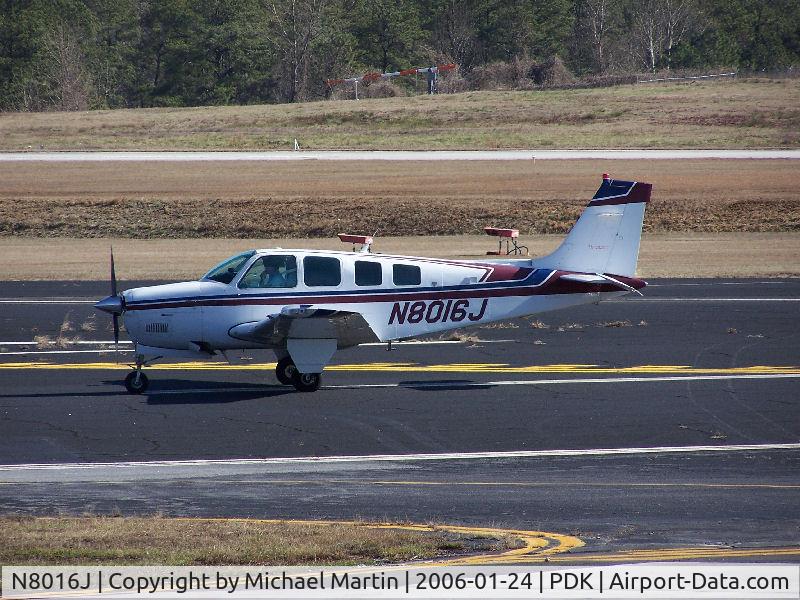 N8016J, 1990 Beech A36 Bonanza 36 C/N E-2562, Taxing to Epps Air Service