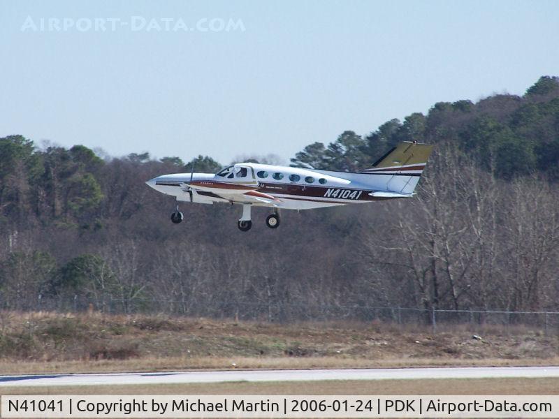 N41041, 1973 Cessna 421B Golden Eagle C/N 421B0412, Departing PDK - Starting to rotate gear.