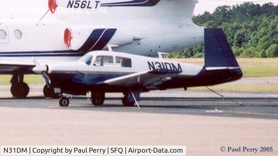 N31DM, 1977 Mooney M20C Ranger C/N 20-1248, Sharing some apron with a big sister