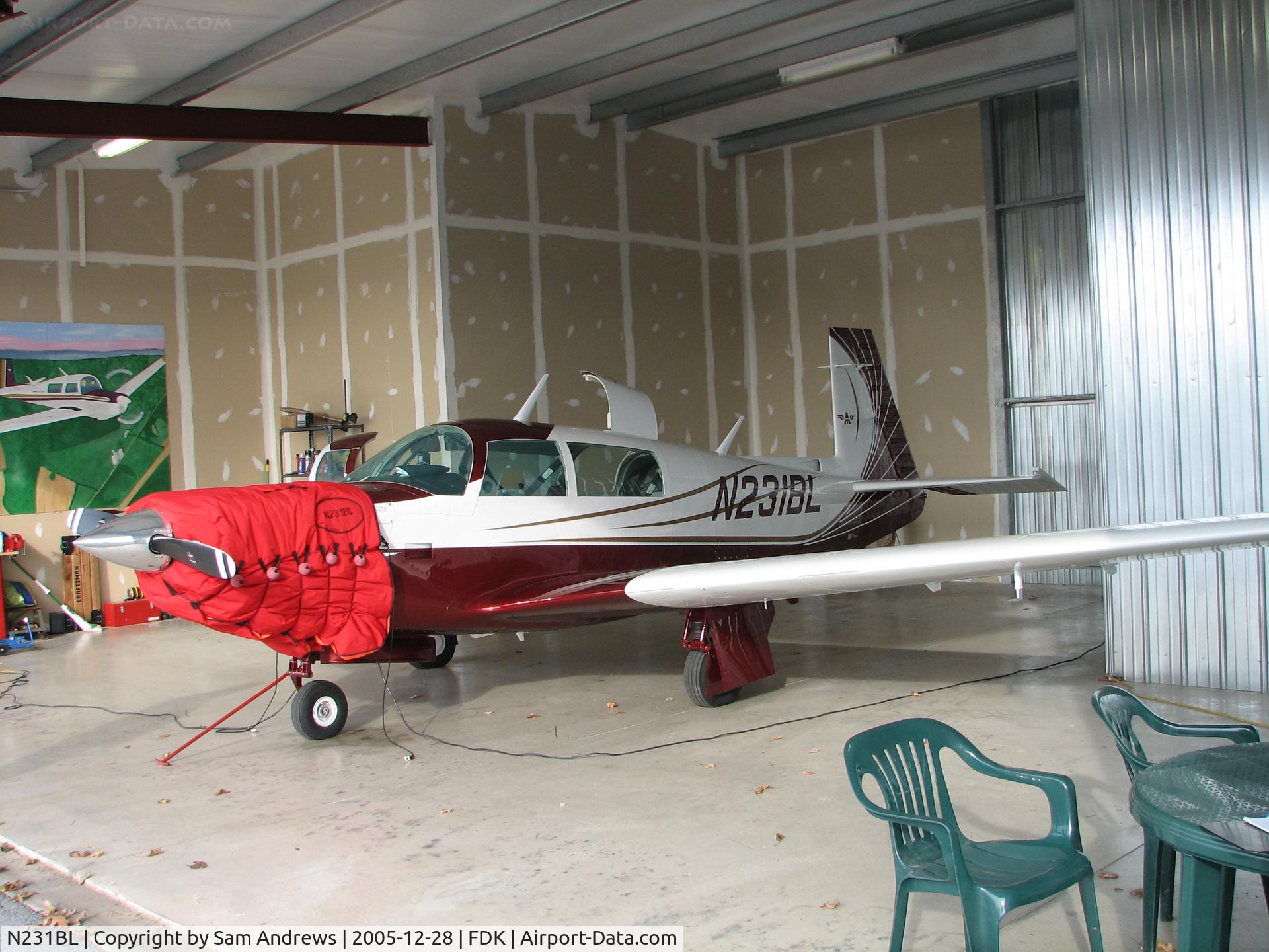 N231BL, 1979 Mooney M20K C/N 25-0117, Greeting the day.  Keeping the nose warm and cozy