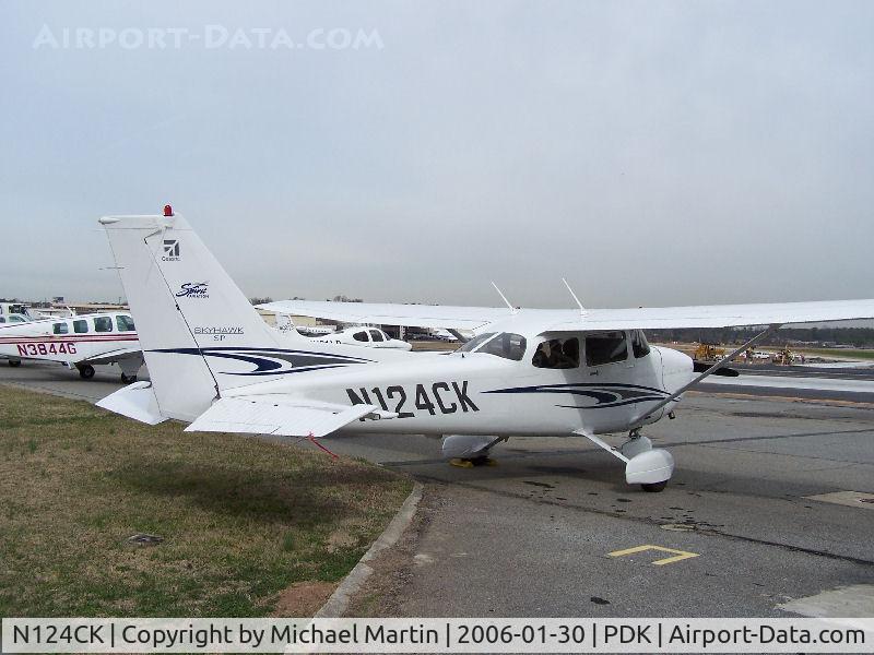 N124CK, 2005 Cessna 172S C/N 172S9808, Tied down @ PDK