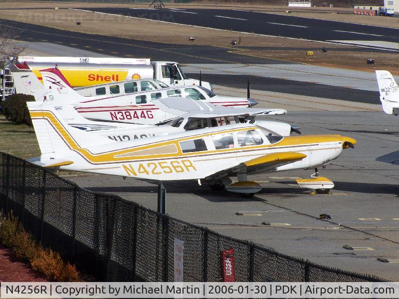 N4256R, 1969 Piper PA-32-300 Cherokee Six Cherokee Six C/N 32-40627, Tied down @ PDK with vairous AC in background