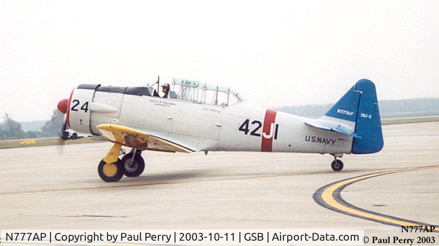 N777AP, North American SNJ-5 Texan Texan C/N 43924, The blue tail is a nice touch, and looks good in the 4-ship formation