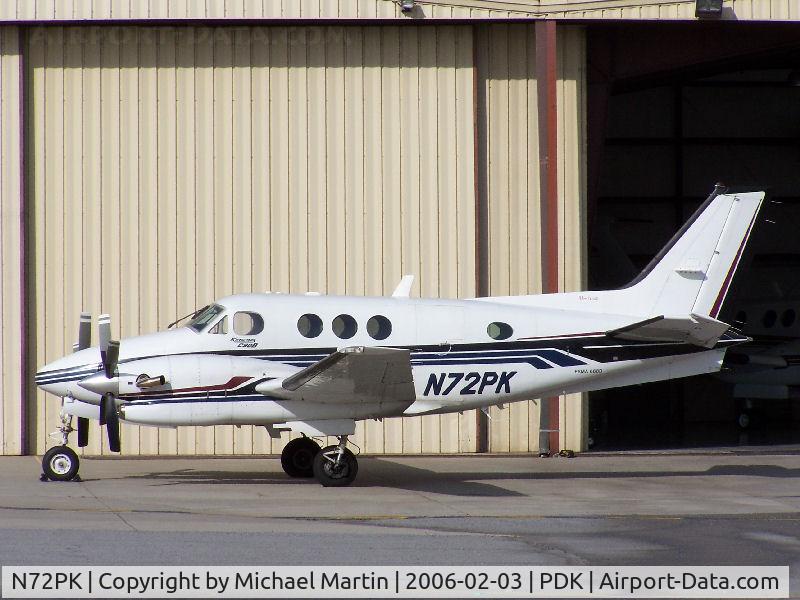 N72PK, 2007 Robinson R44 II C/N 11581, Hangered @ PDK