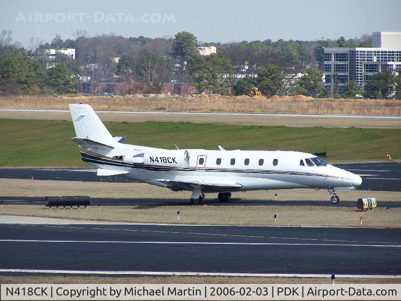 N418CK, 1999 Cessna 560XL C/N 560-5042, Taxing to Mercury Air Center
